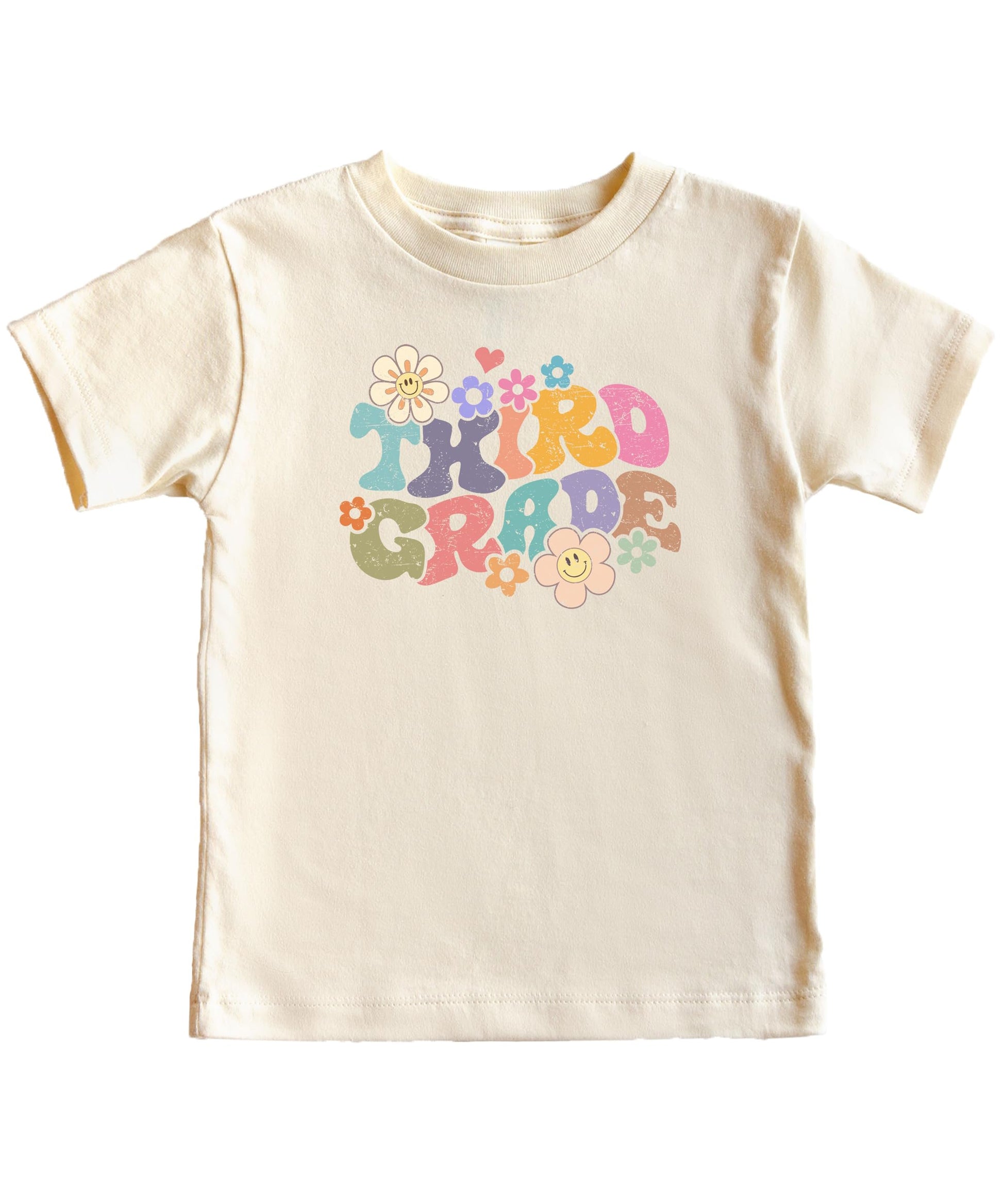 Young girl wearing 3rd grade groovy daisy first day of school t-shirt