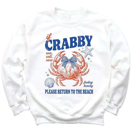 Woman wearing white 'If Crabby Please Return to the Beach' crewneck sweatshirt in relaxed fit