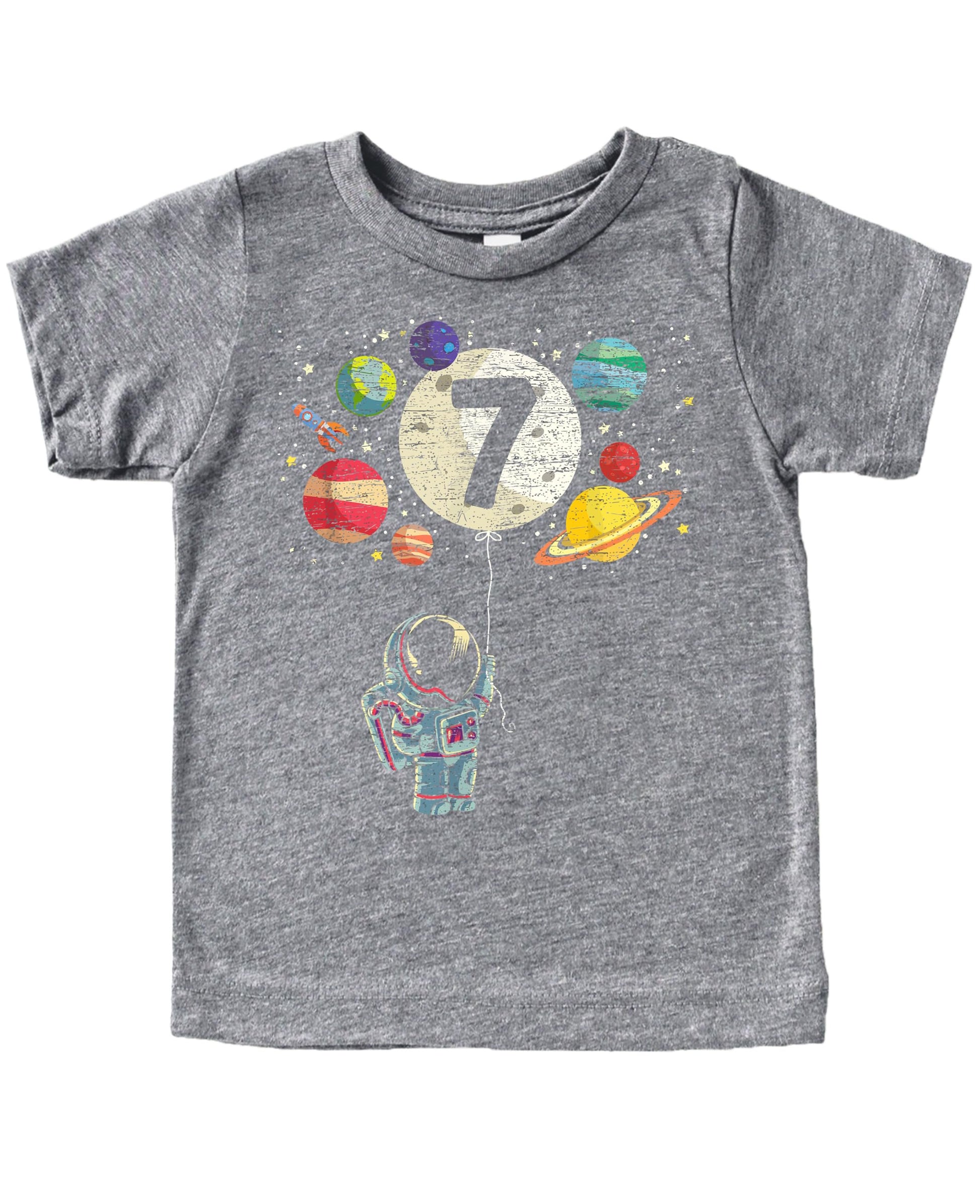 Front view of space-themed 7th birthday tee for boys and girls with rocket and planet design