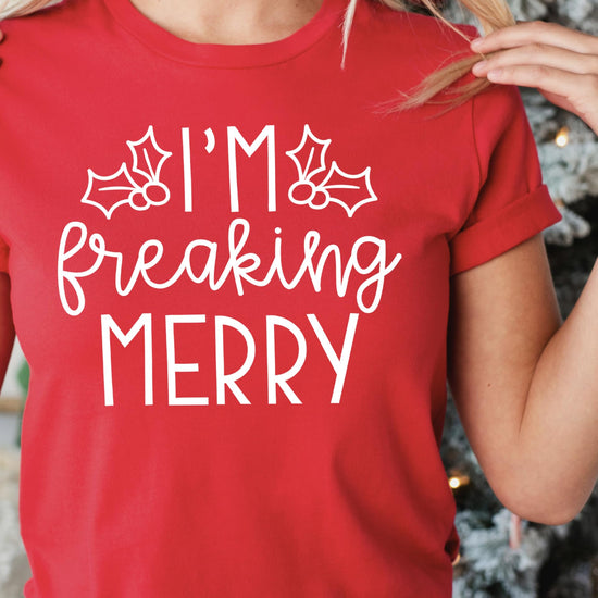 Back or detail view of women's vintage green I'm Freaking Merry funny holiday graphic shirt