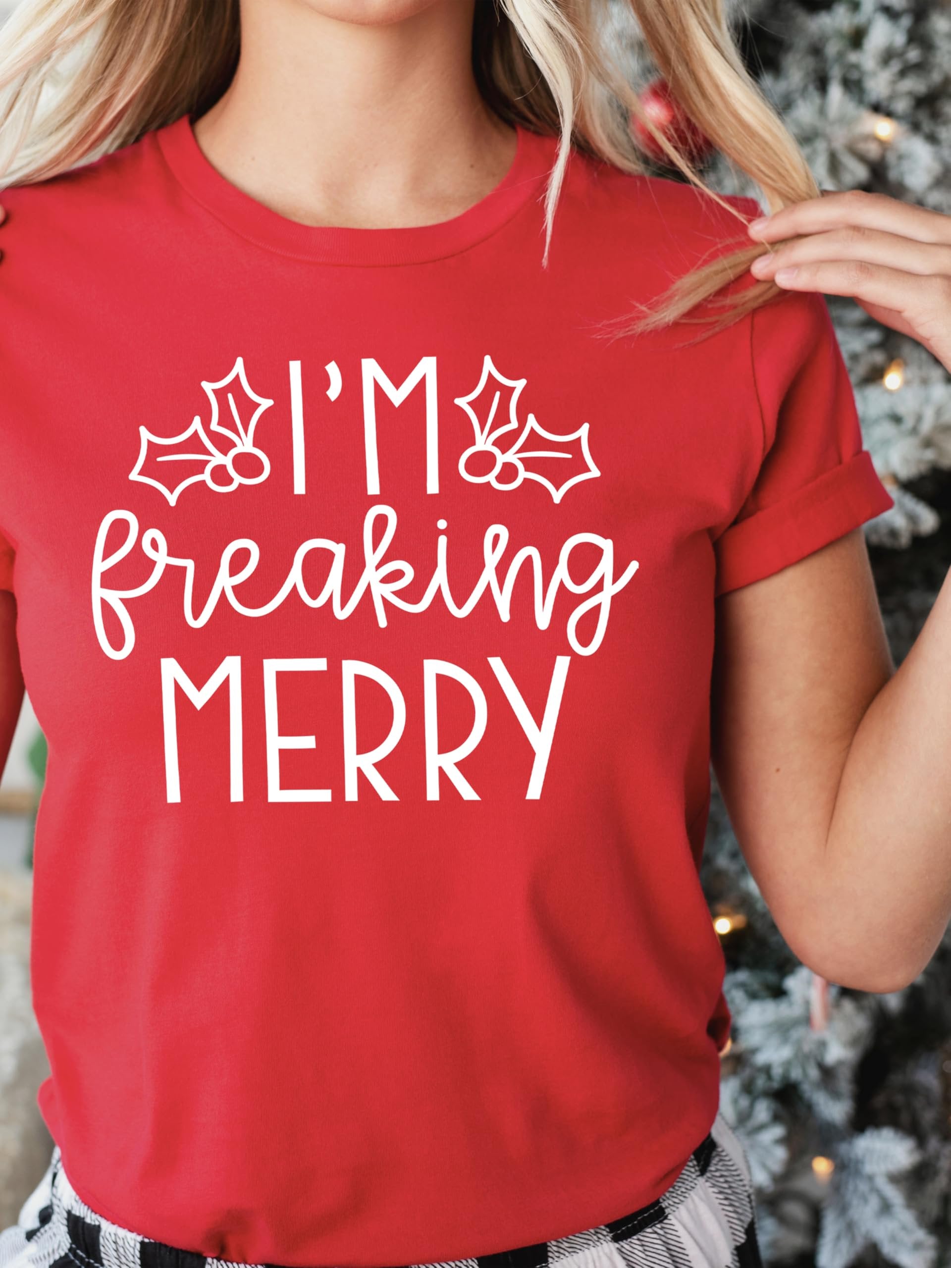 Back or detail view of women's vintage green I'm Freaking Merry funny holiday graphic shirt