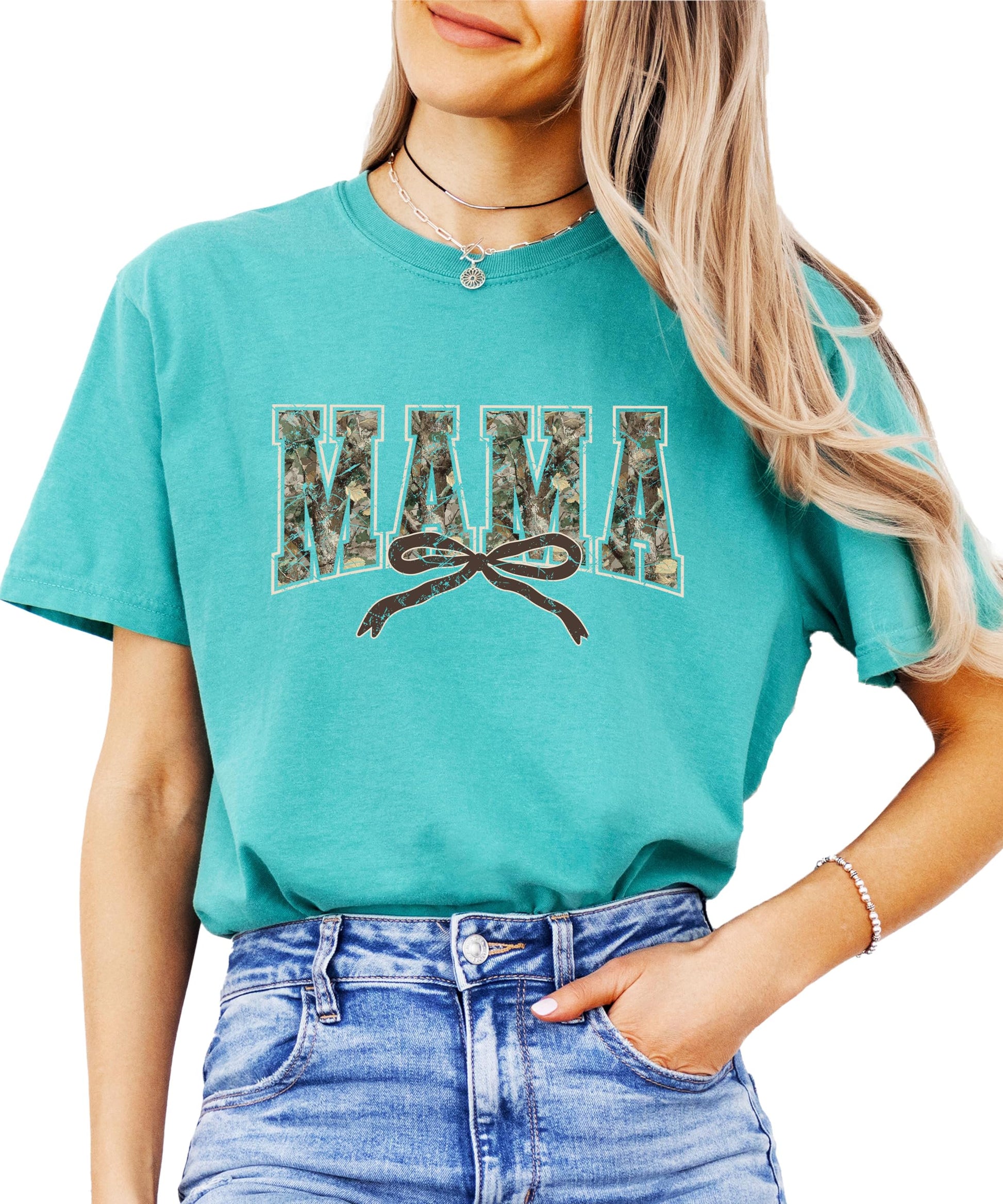 Lifestyle photo of women wearing trendy seafoam Mama camo tee, relaxed casual fit
