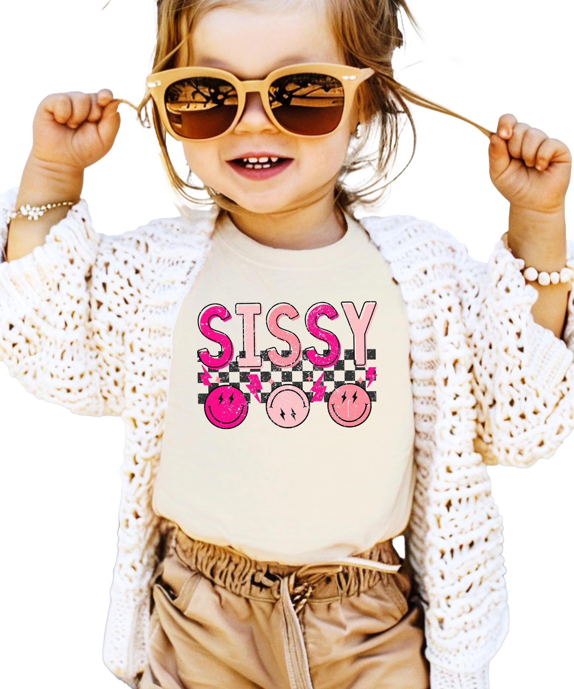 Detail shot of professional print quality on pink Sissy graphic tee for girls