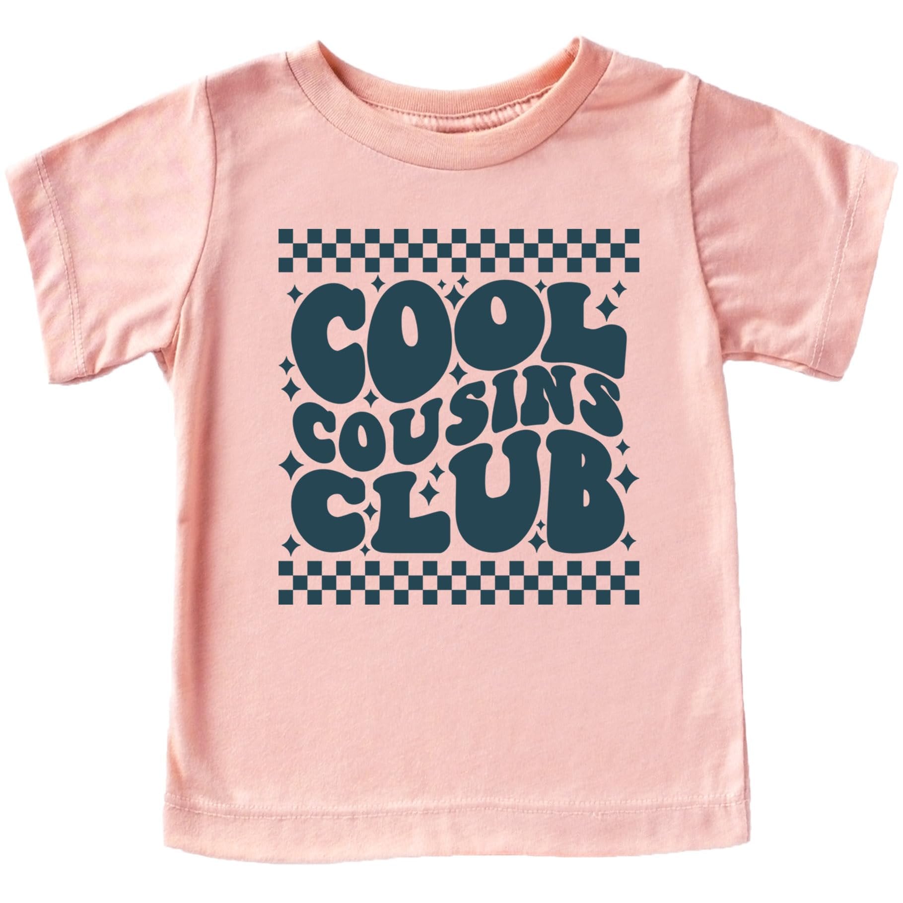 Close-up of Cool Cousins Club vintage-style graphic print on peach t-shirt