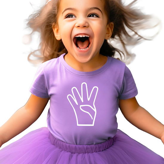 Detail shot of professional-quality 4th birthday print on black kids t-shirt