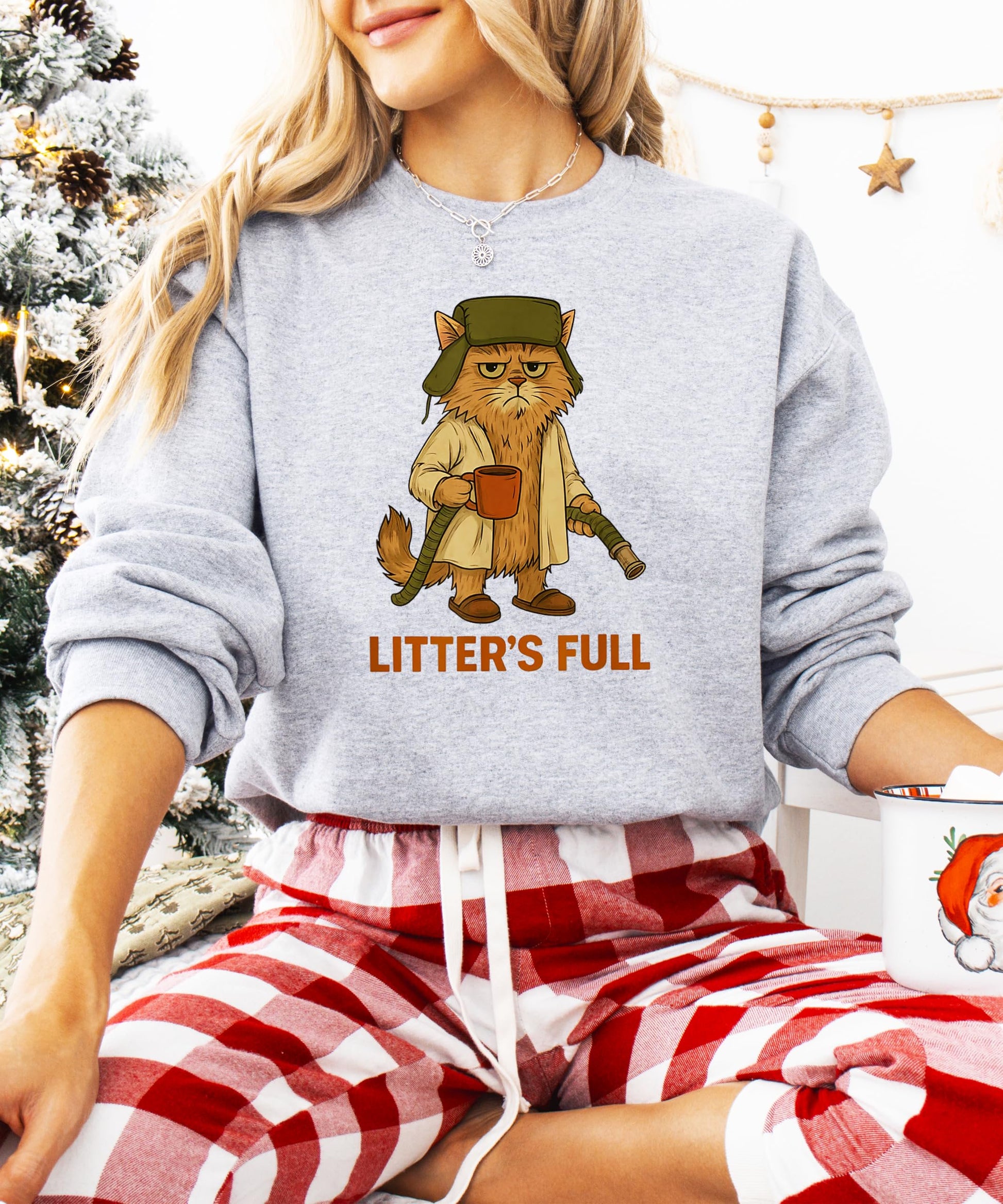 Detail shot of Litter's Full grumpy holiday cat graphic print on gray sweatshirt