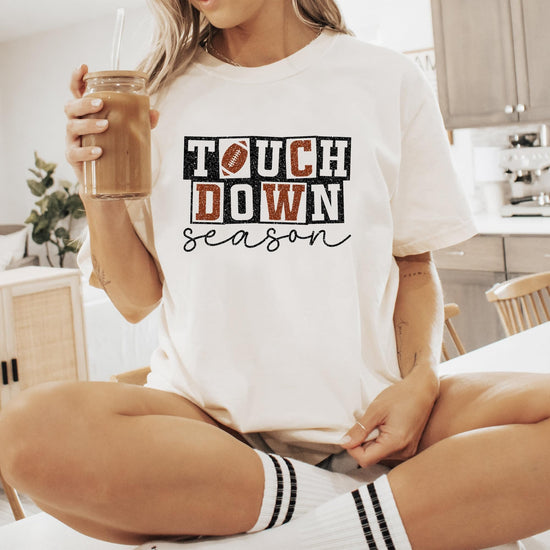 Side view of Touchdown Season oversized tee displaying comfortable relaxed fit