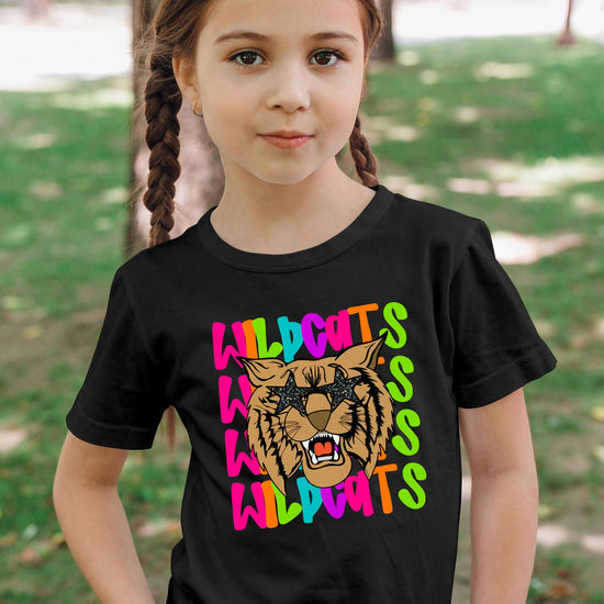 Detail view of wildcats mascot print with neon colors and star elements