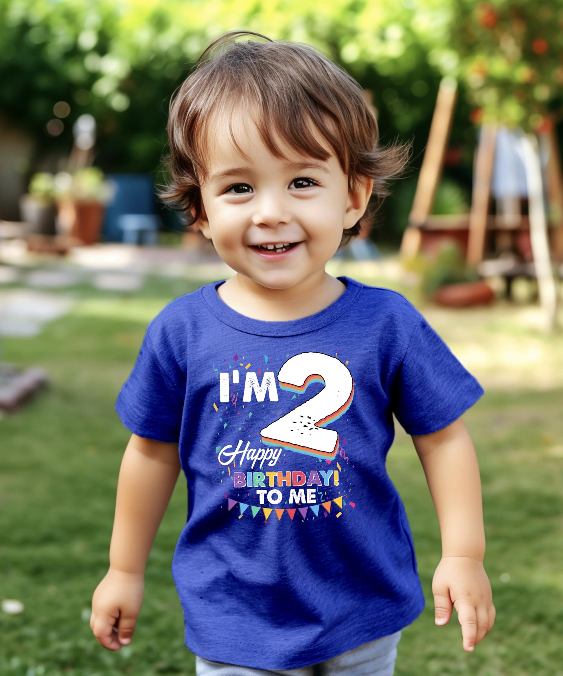 Lifestyle photo of toddler in 'I'm 2' birthday shirt perfect for birthday party or cake smash photos