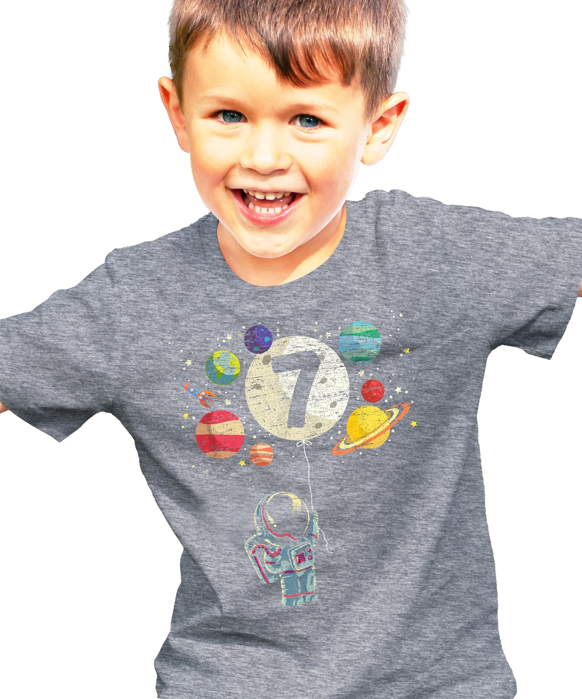 Flat lay of kids space birthday shirt showing full rocket astronaut and planets graphic
