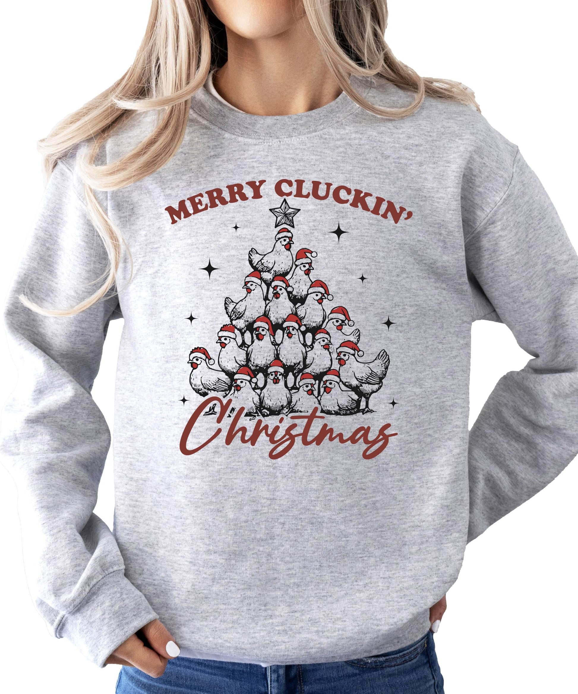Woman wearing a funny white Christmas pullover sweatshirt with chicken holiday graphic