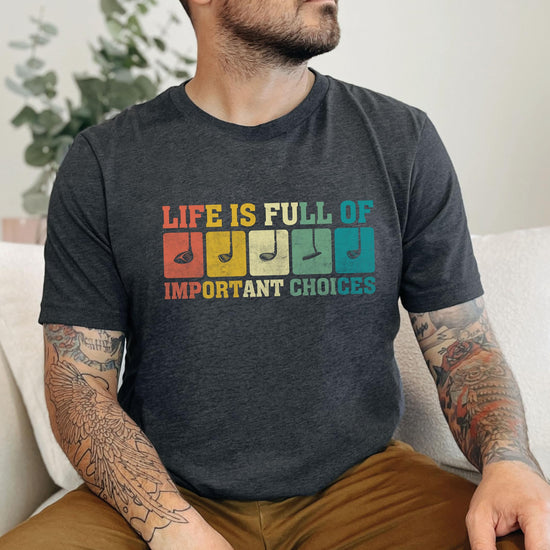 Flat lay of men's dark gray golf humor t-shirt, great gift for husband or golf dad