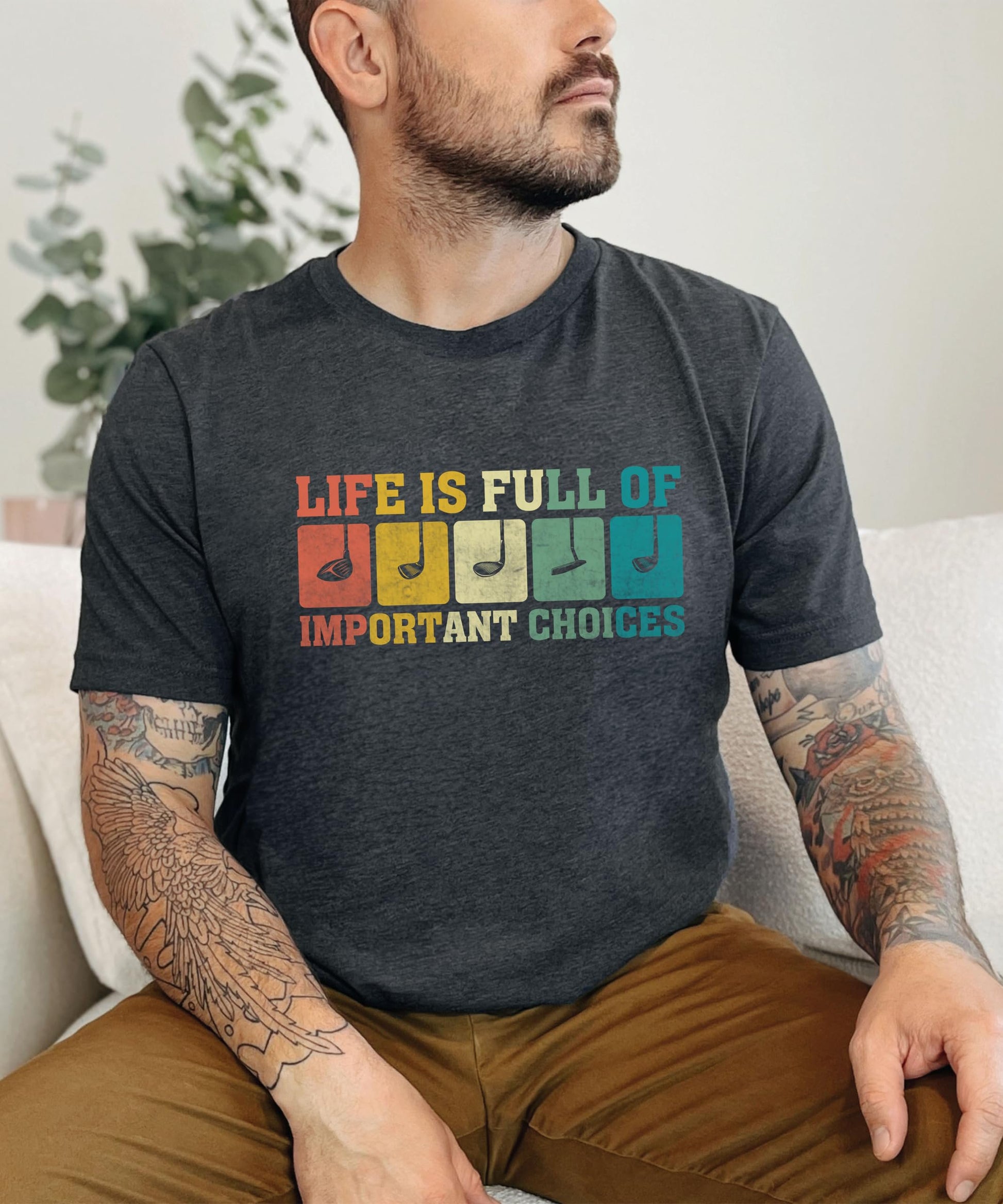 Flat lay of men's dark gray golf humor t-shirt, great gift for husband or golf dad