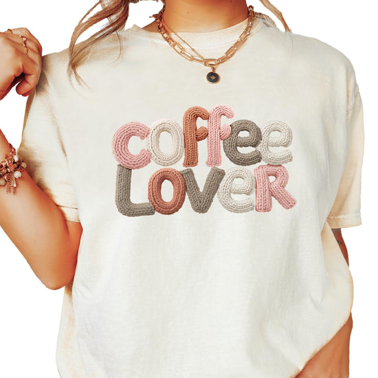 Women's ivory graphic tee with ink-printed coffee lover faux yarn-patch design
