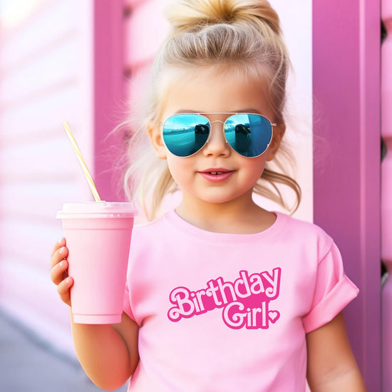 Olive Loves Apple purple birthday girl doll shirt styled as a birthday party outfit for girls