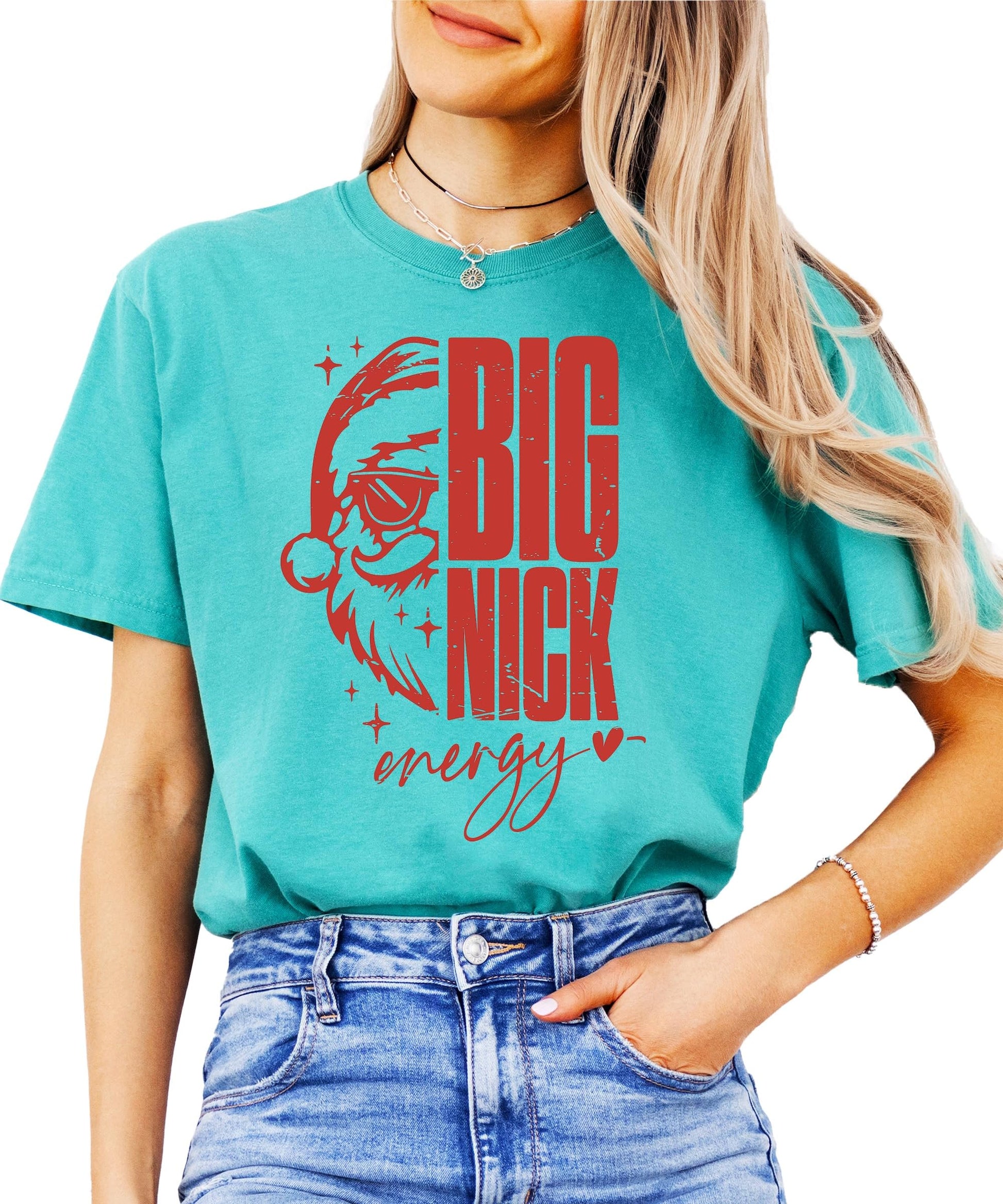 Women wearing Big Nick Energy funny Christmas tee with bold Santa sunglasses design