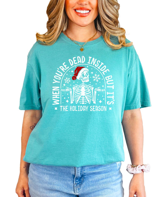 Dead inside holiday season Christmas skeleton shirt in seafoam green with Santa hat design