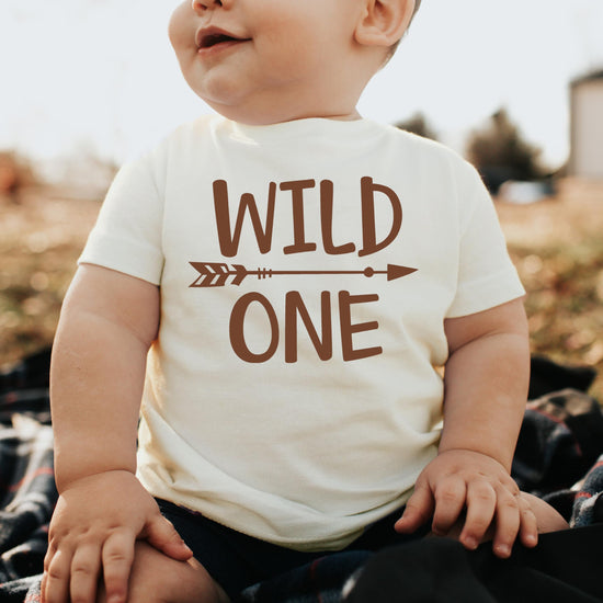 Black toddler birthday shirt with Wild One boho design close-up view