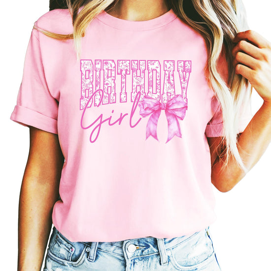 Flat lay of Birthday Girl floral shirt showing full design and shirt color