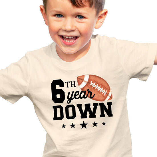 Youth small natural birthday shirt with football graphic sixth birthday design