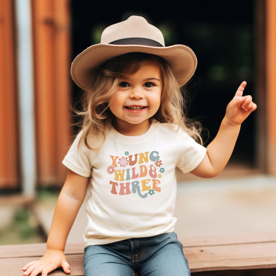 Back view of Young Wild Three birthday shirt showing design placement