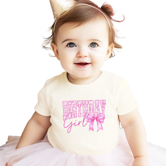 Birthday Girl shirt product shot displaying pink bow and floral elements