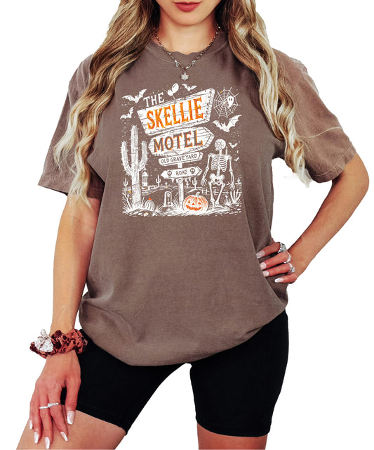 Skellie Motel retro Halloween graphic tee in seafoam, featuring skeleton and spooky motel design, unisex adult fit