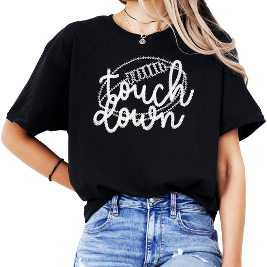 Women's black football touchdown graphic tee with faux embroidery design