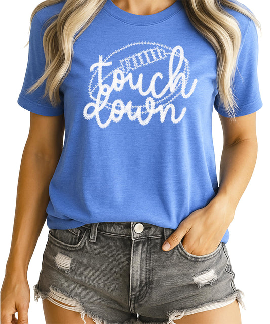 Close-up of trendy touchdown faux embroidery graphic on black women's t-shirt