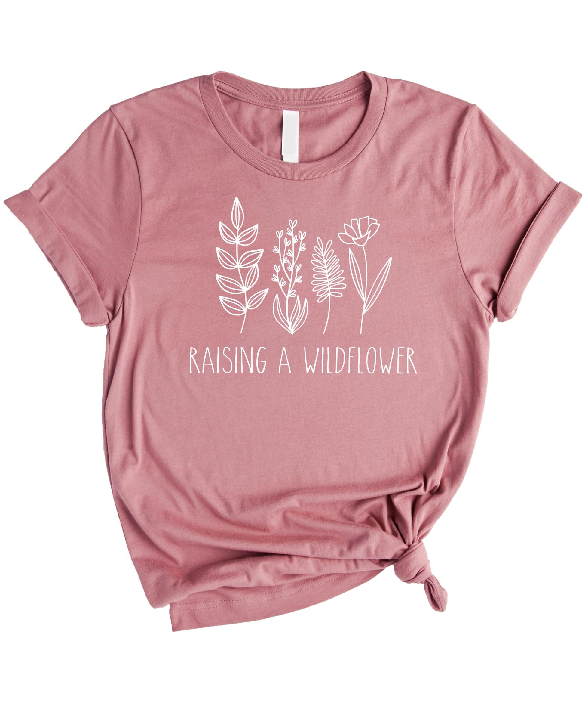Mom and child wearing matching mauve raising wildflowers graphic tees