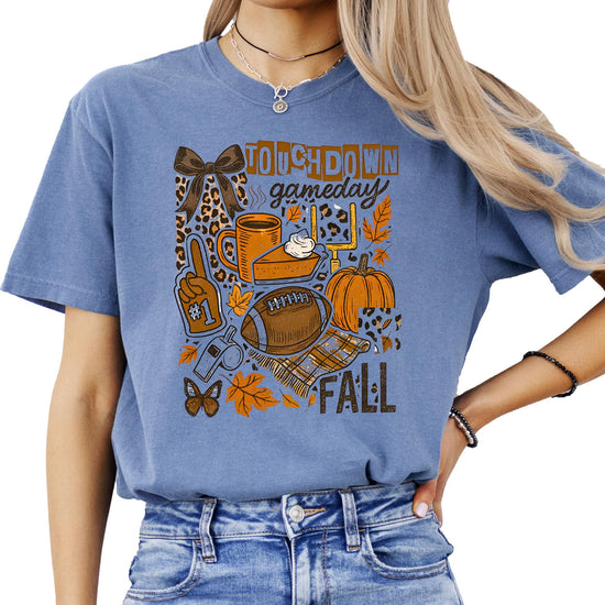Trendy Touchdown fall football graphic tee with pumpkins, coffee, pie and autumn leaves design
