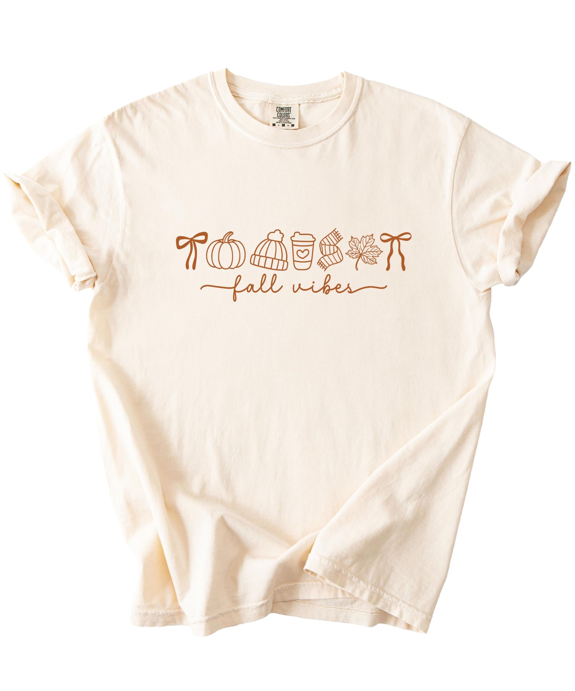 Fall themed graphic t-shirt product shot displaying pumpkin coffee leaf print