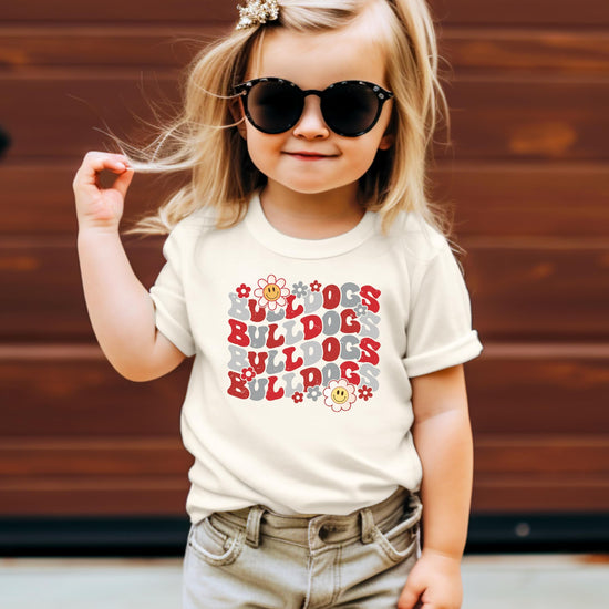 Red Bulldogs school pride shirt flat lay showing design and sizing options