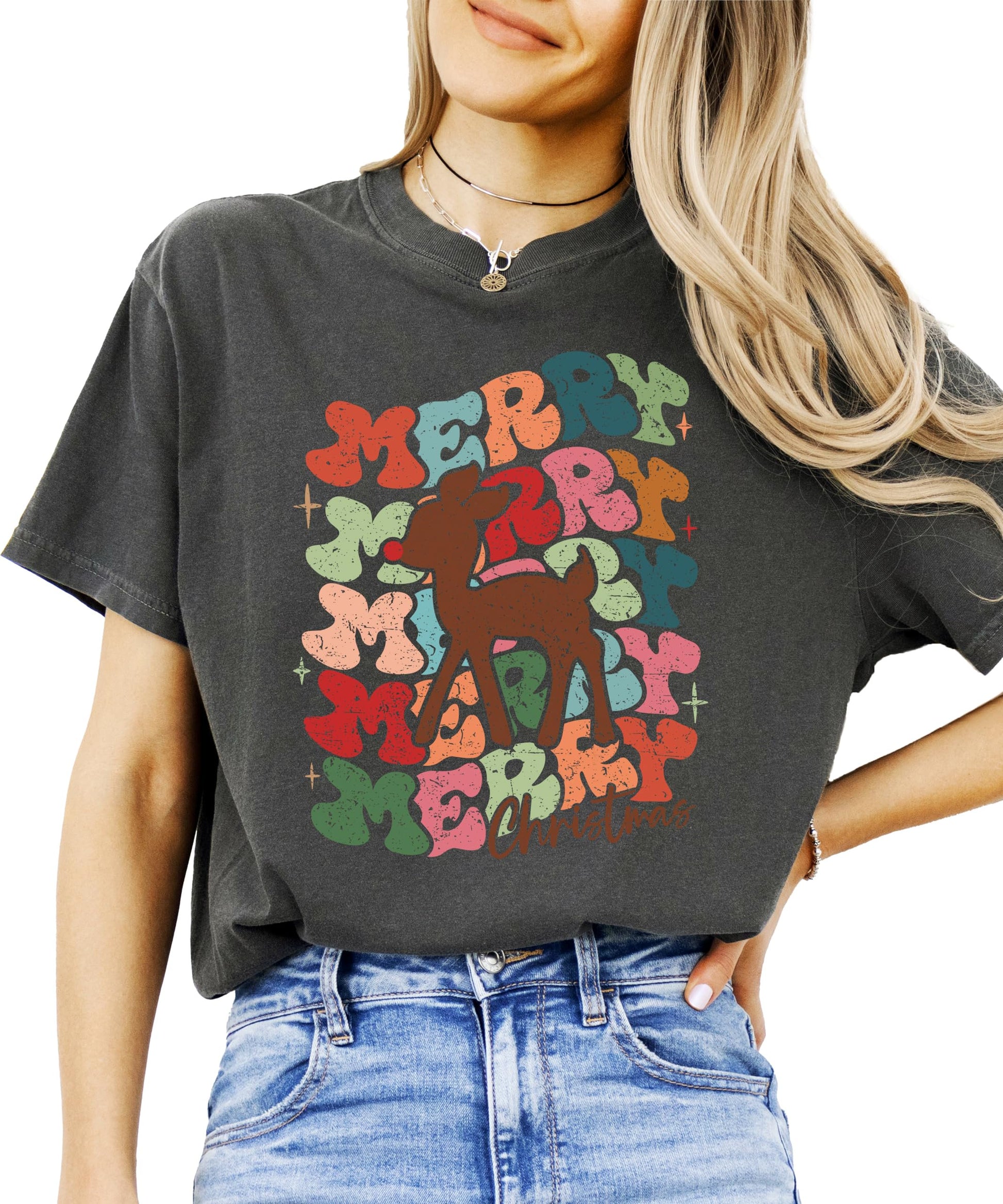 Women's retro Merry Christmas graphic tee with groovy red-nosed reindeer design in festive holiday colors
