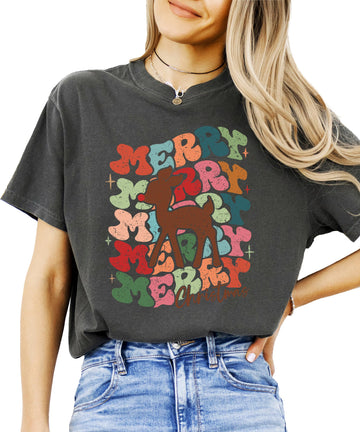 Women's retro Merry Christmas graphic tee with groovy red-nosed reindeer design in festive holiday colors