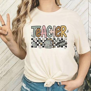 Women's back to school teacher shirt with groovy daisy design, natural colorway