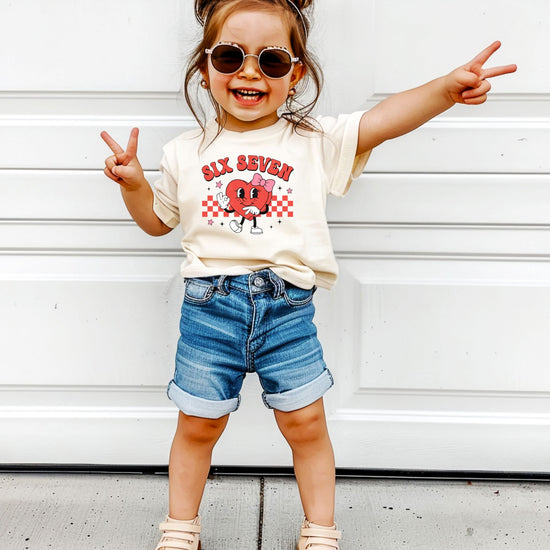 Six seven kids Valentine's Day tee displayed showing chill graphic style and fit