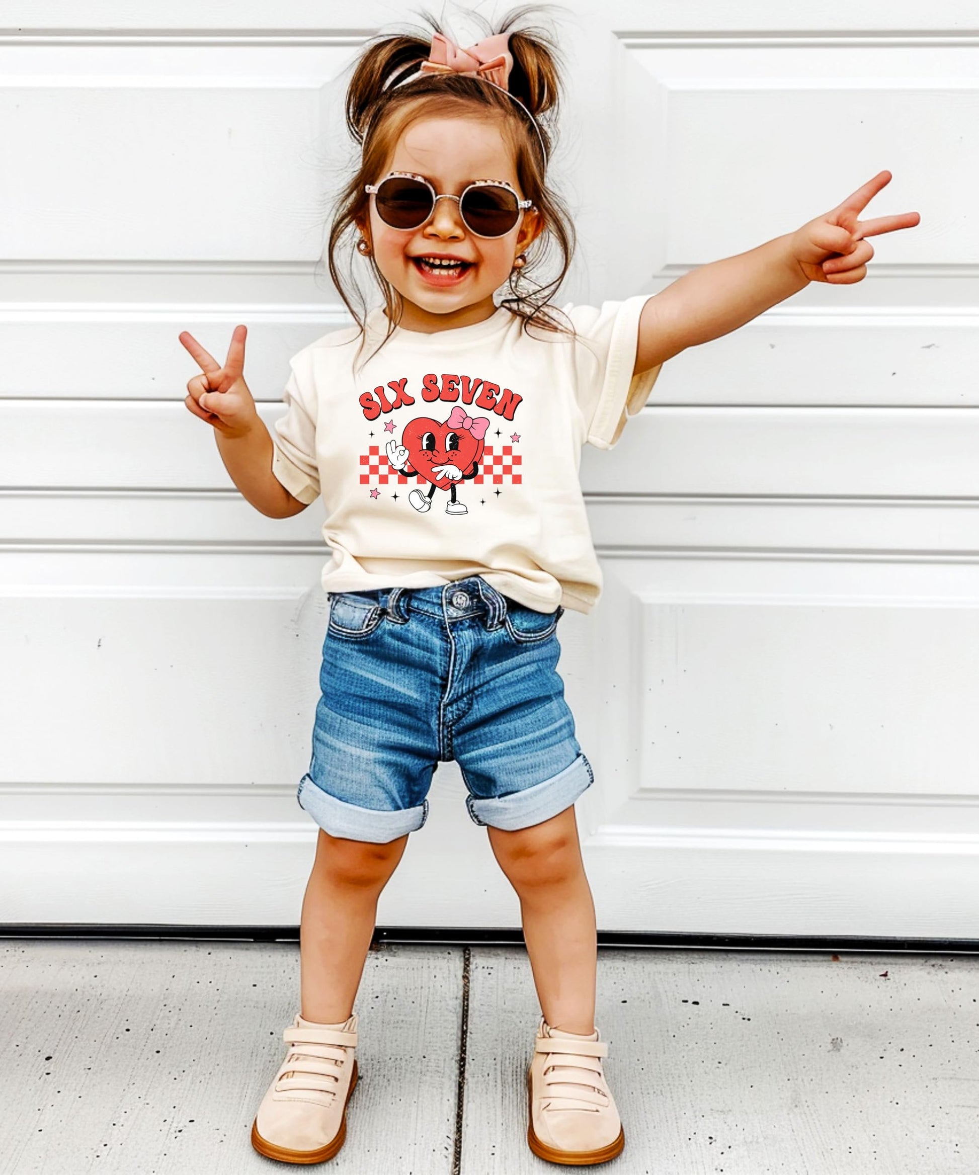 Six seven kids Valentine's Day tee displayed showing chill graphic style and fit