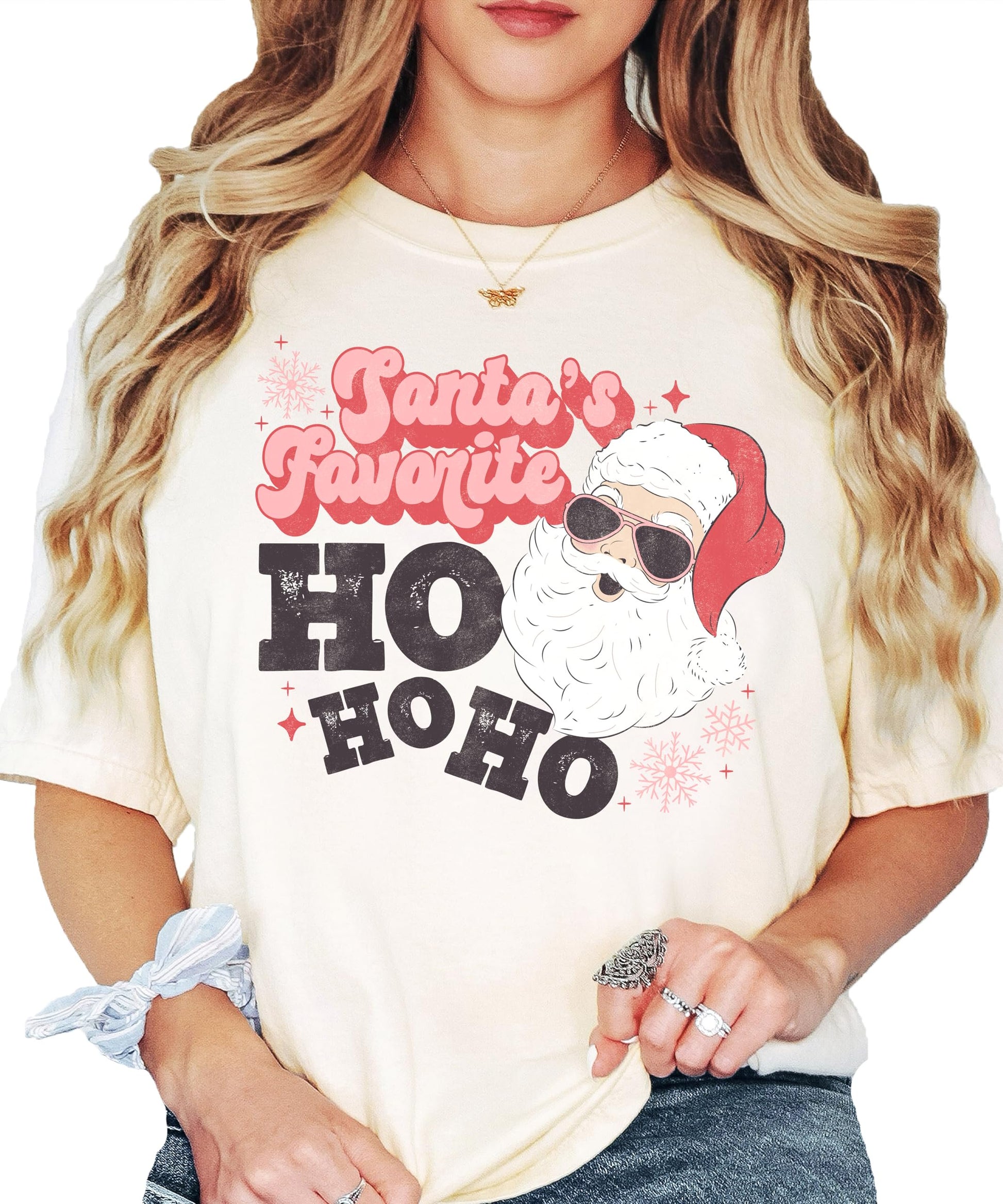 Model wearing Santa's Favorite Ho Ho Ho funny holiday tee in seafoam green