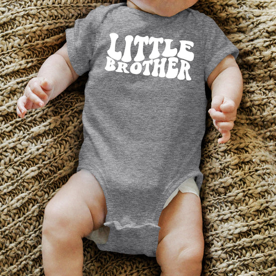 Little Brother baby onesie displayed to show sizing and fit for newborns