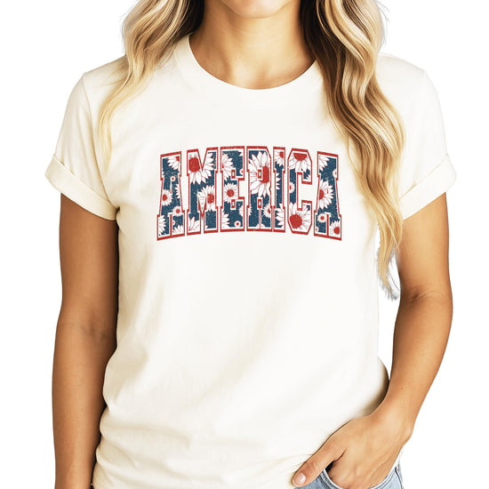 Youth girls patriotic America sunflower tee in natural color with red and blue graphic