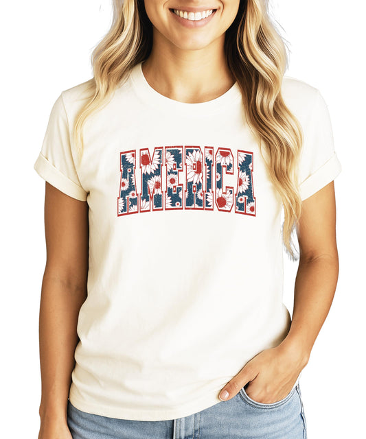 Youth girls patriotic America sunflower tee in natural color with red and blue graphic