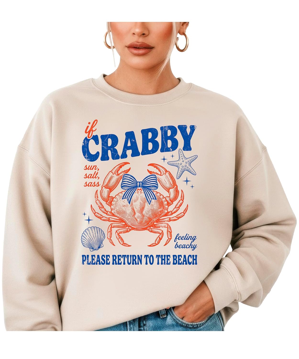 Family wearing matching 'If Crabby Please Return to the Beach' white crewneck sweatshirts in adult and youth sizes