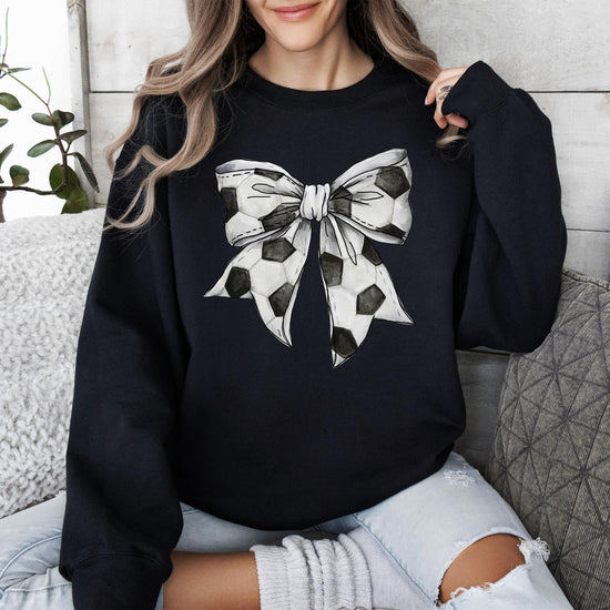 Soccer-themed coquette bow sweatshirt for women and teens in cozy gray color