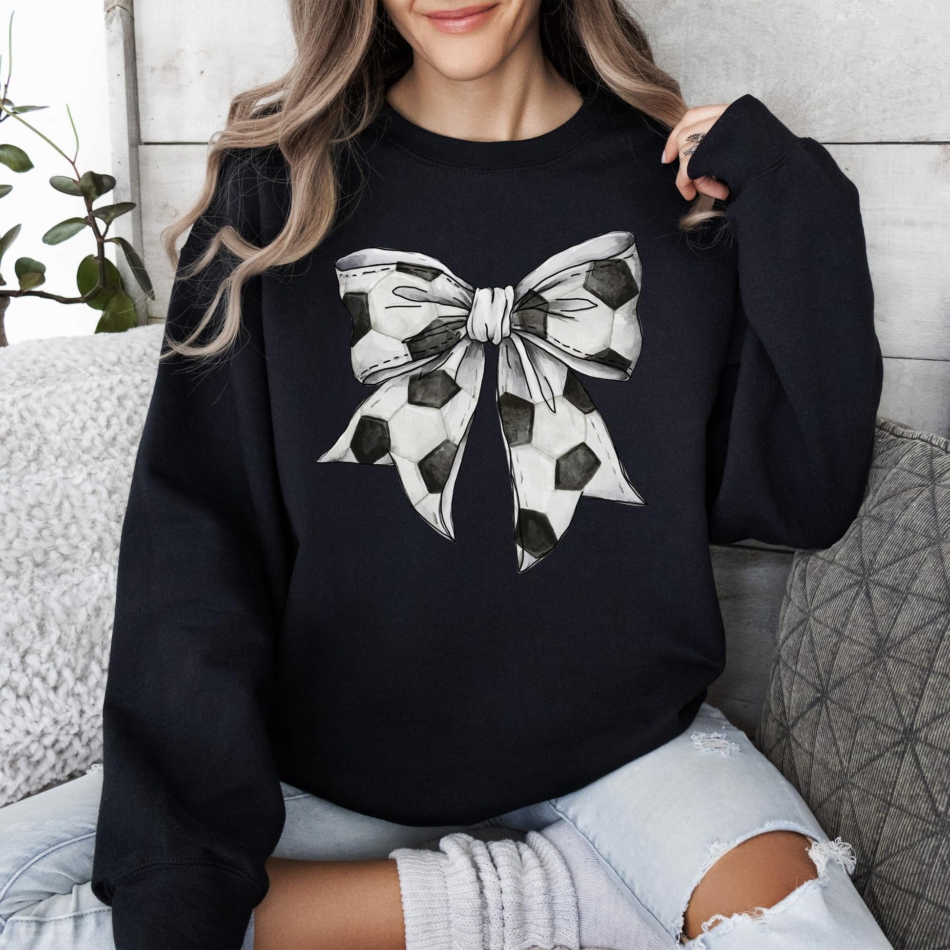 Soccer-themed coquette bow sweatshirt for women and teens in cozy gray color