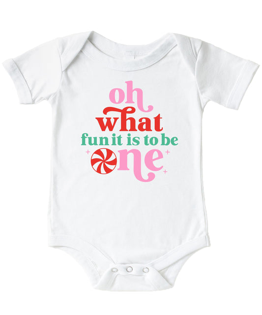 Front view of festive baby bodysuit for girls first Christmas birthday celebration