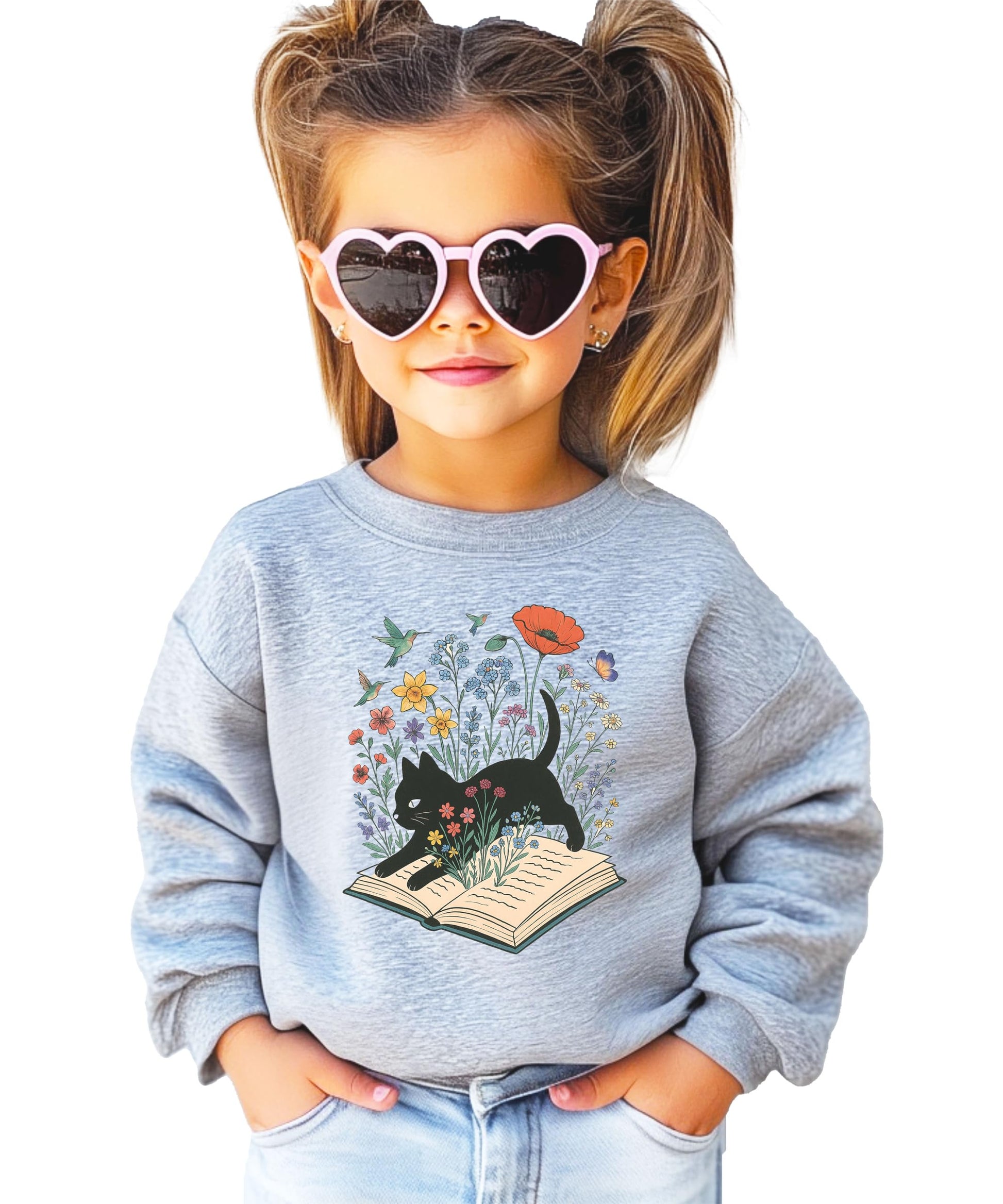 Close-up of black cat floral book lover sweatshirt print showing vibrant colors and detail on white fabric