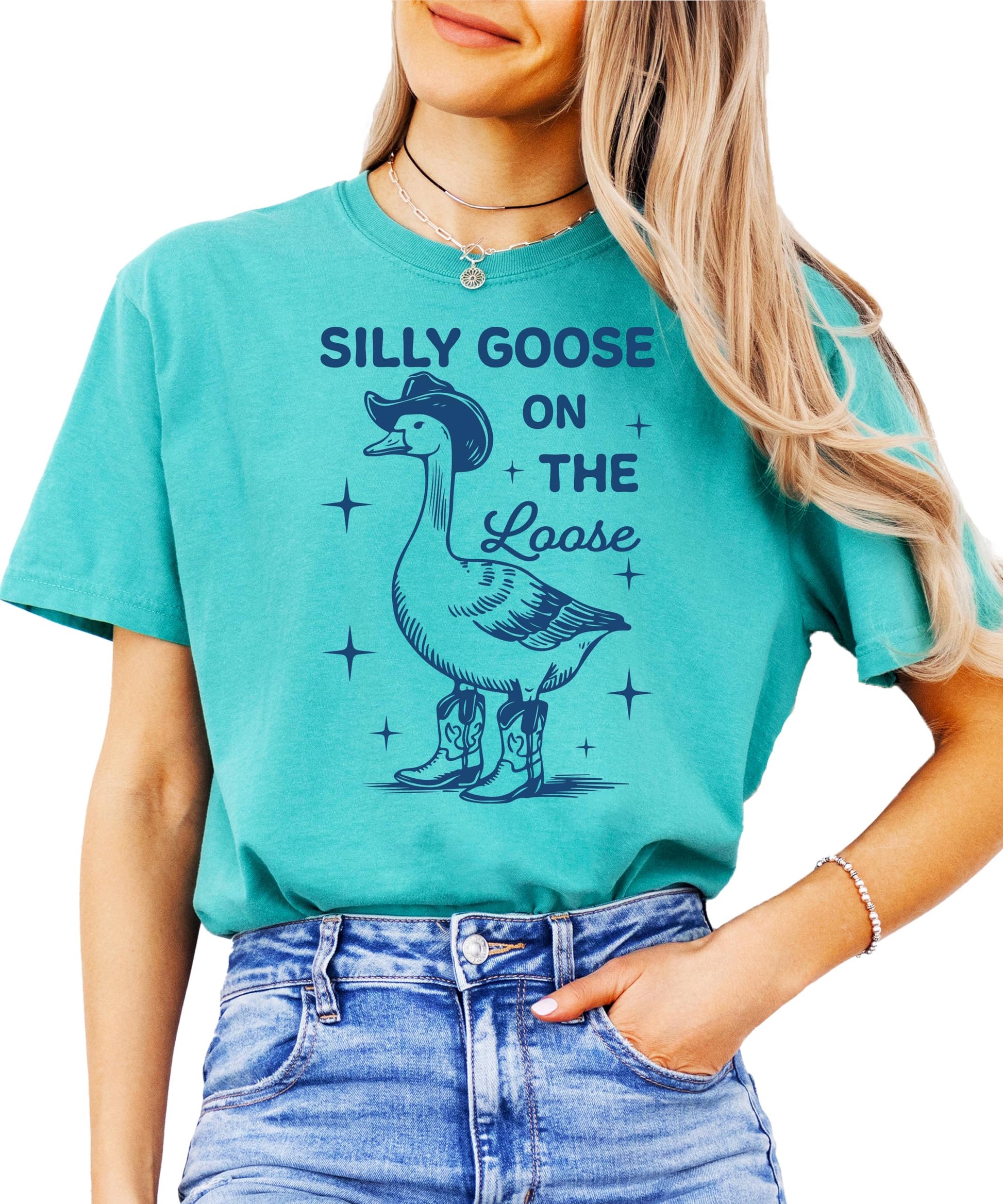 Woman wearing ivory Silly Goose graphic tee showing relaxed oversized fit