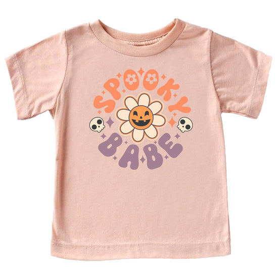Close-up of Spooky Babe Daisy Pumpkin Halloween print on girls peach graphic tee