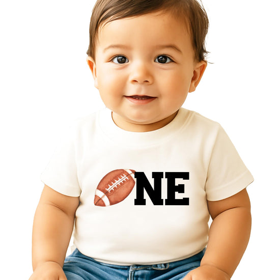 Family matching football first birthday shirts displayed together